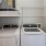 a washing machine and dryer in a closet
