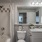 a bathroom with a tub sink and toilet