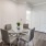 a dining room with a table and chairs