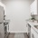 a kitchen with white cabinets