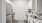 a kitchen with white cabinets