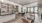 a large kitchen with a bar and dining table